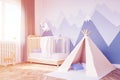 Close up of baby`s room, tent and mountain, toned Royalty Free Stock Photo